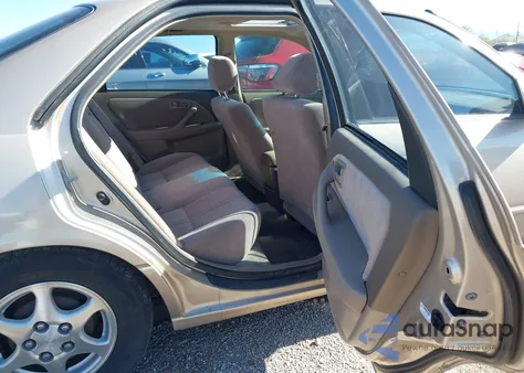 1998 Toyota Camry Le z USA, uszkodzony, nr VIN JT2BG28K0W0185903